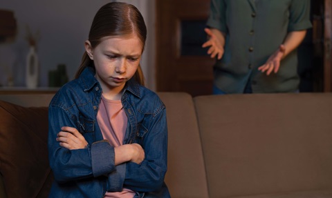 Young child being scolded