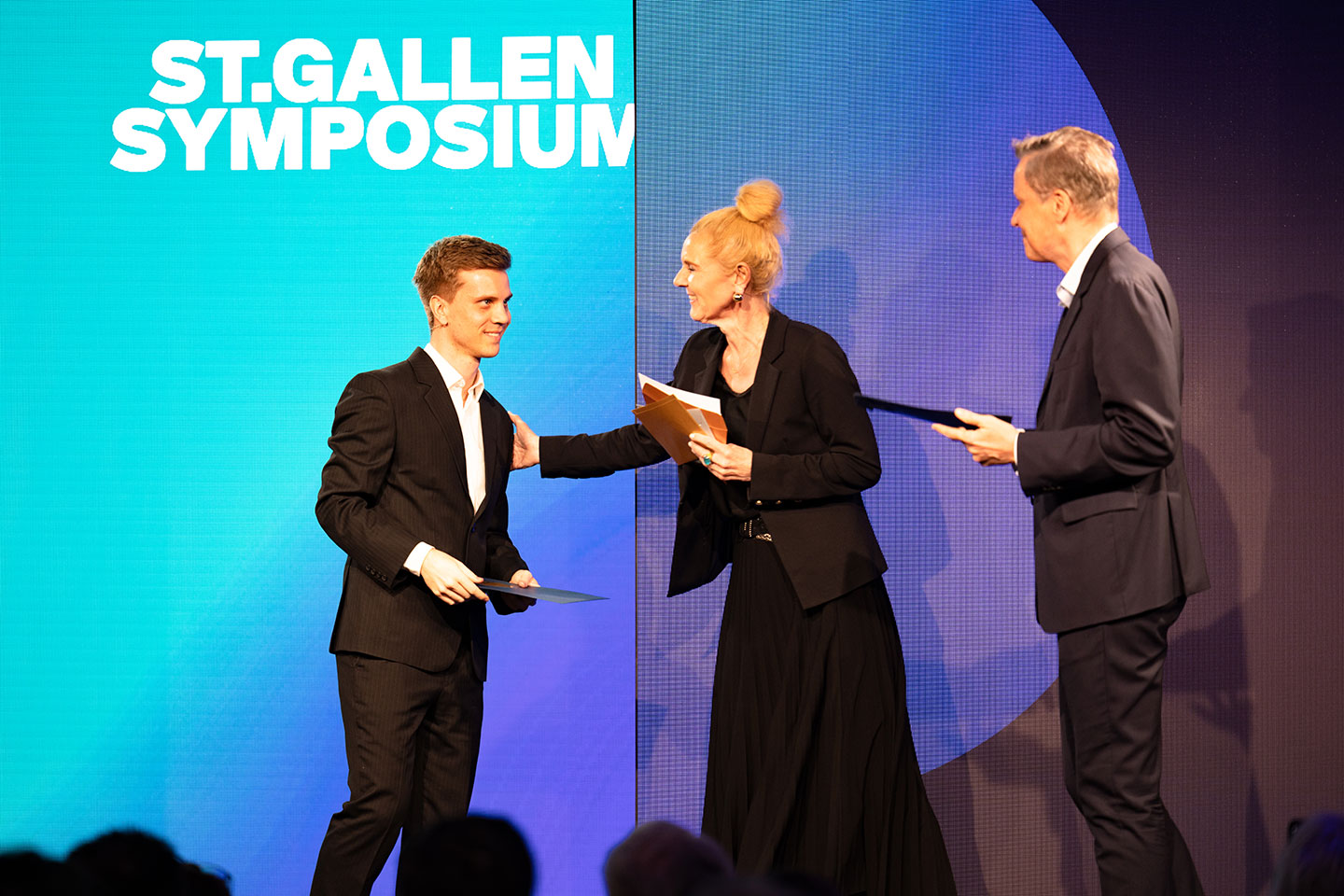 Photo of ntu postgrad received award at the 53rd St. Gallen Symposium 2024 